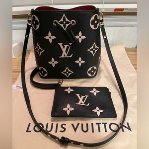 Used limited edition Louis Vuitton Neonoe bag with matching wristlet.